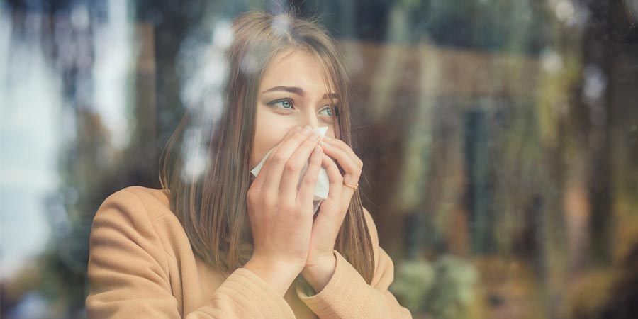 Iaq Woman Blowing Nose